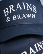 Load image into Gallery viewer, Brains &amp; Brawn Curved Brim Snapback (Navy &amp; Champagne)
